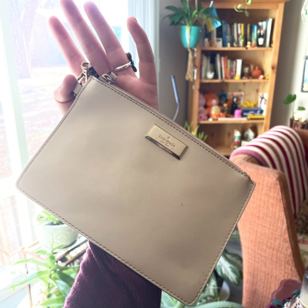 Cream Kate Spade Wristlet